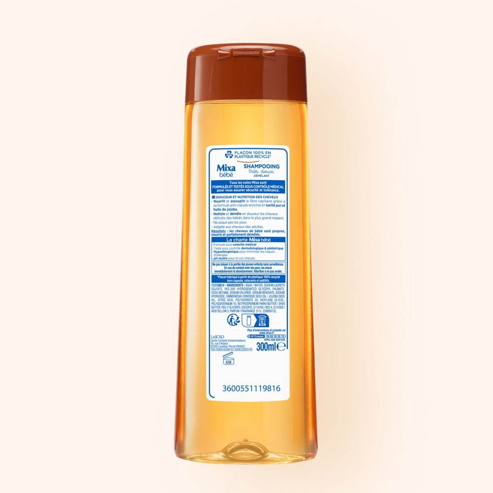 MIXA Shampooing Démêlant Très Doux Karité 300ml Soin Capillaire Hypoallergénique Cheveux Emmêlés Bébé Enfant Beurre Karité Formule Douce - Nova Parapharmacie
